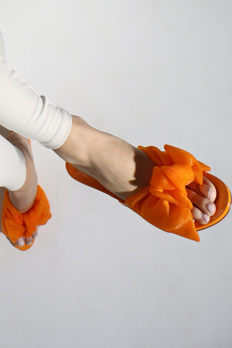 ORANGE PATENT BOW MULES