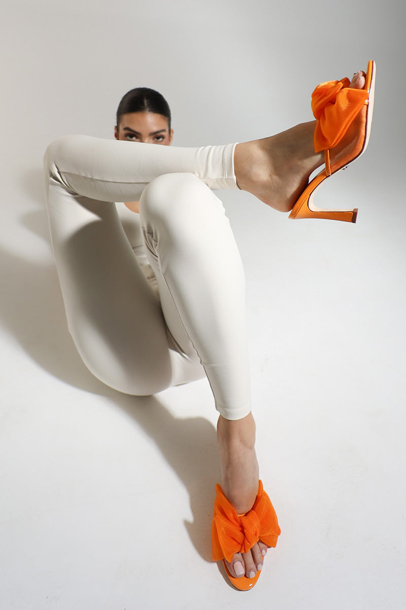 ORANGE PATENT BOW MULES