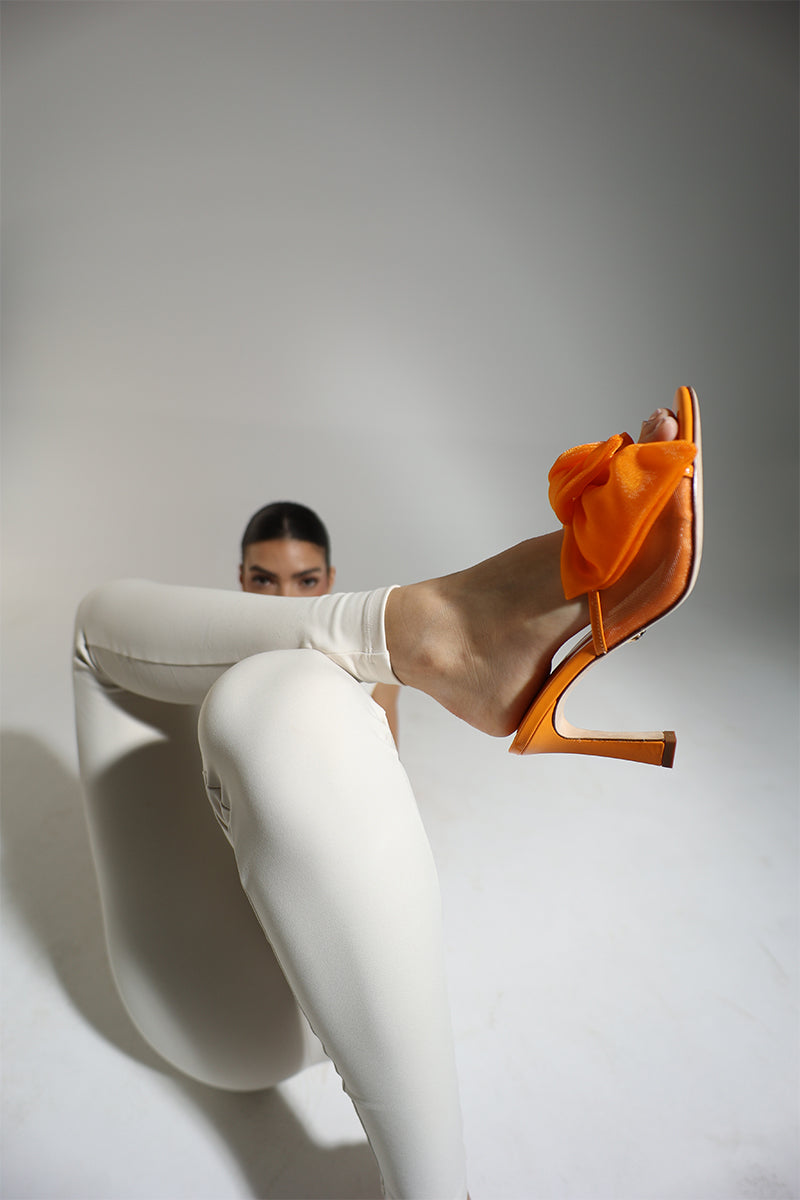 ORANGE PATENT BOW MULES