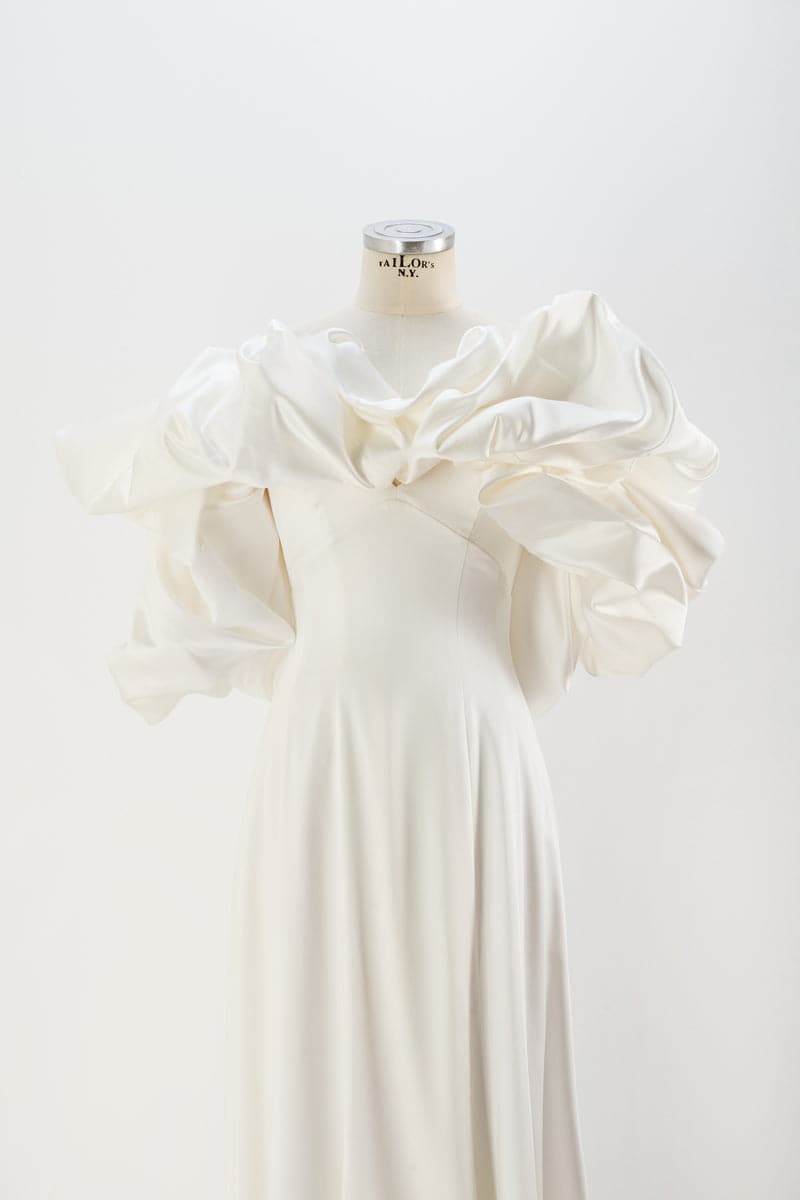 MINIMALISTIC SIMPLE GOWN WITH REMOVABLE MERINGUE FLOUNCES TRAIN
